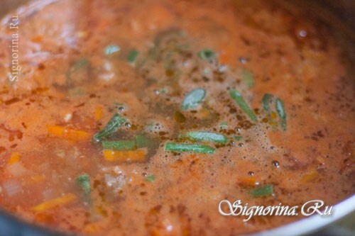 Варите суп при небольшом кипении около получаса, пока рис в фрикадельках не свариться: фото 10